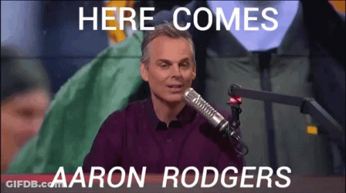 Man Purple Shirt Says Here Comes Aaron Rodgers GIF