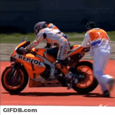 Man Pushing Motorcycle With Repsol GIF