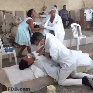 Man Pushing Patient On Stretcher In Hospital Hallway Bravo GIF