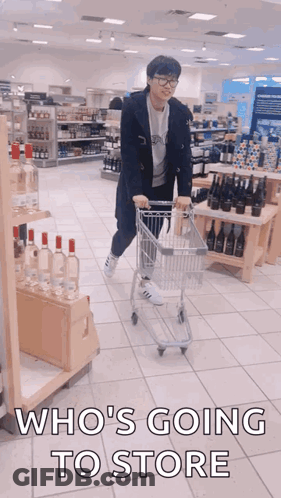 Man Pushing Shopping Cart Saying Who's Going To Store GIF