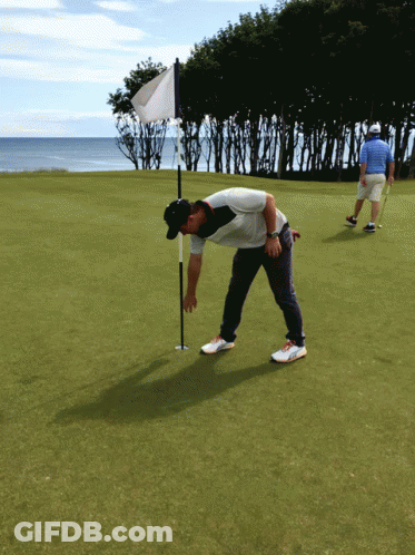 Man Puttin Golf Ball GIF
