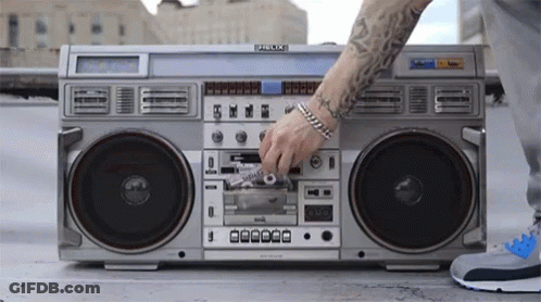 Man Putting Cassette Into Boombox Saying Palace GIF