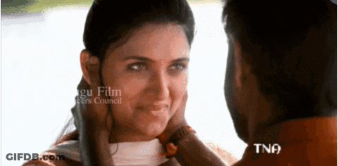 Man Putting Hand On Woman's Face With TNA GIF