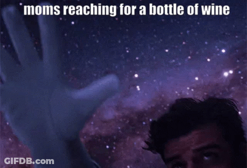 Man Reaching For Bottle Of Wine GIF