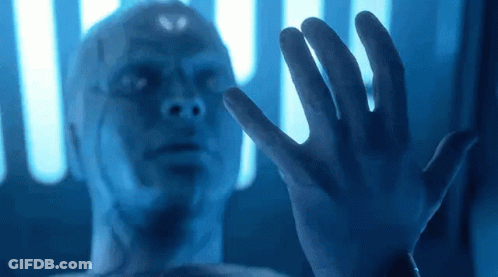 Man Reaching Toward Glass Wall GIF