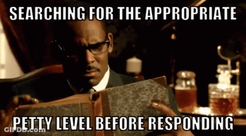 Man Reading Book Searching For The Appropriate Petty Level Before Responding GIF