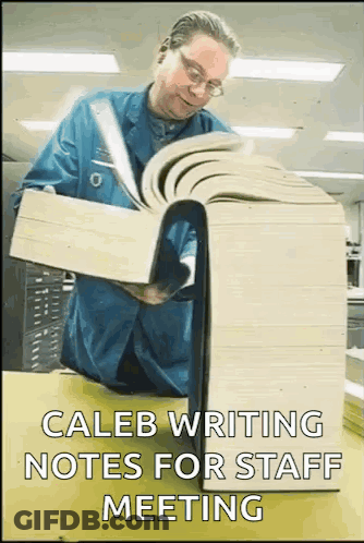 Man Reading Caleb Notes For Staff Meeting GIF