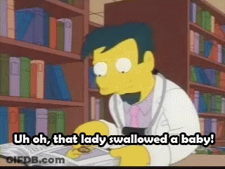 Man Reading Uh Oh That Lady Swallowed A Baby GIF