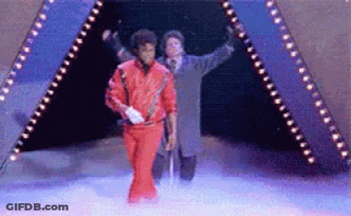 Man Red Jacket White Gloves Walking Through Tunnel GIF