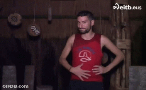 Man Red Tank Top Hands On Hips Eitb.eus GIF