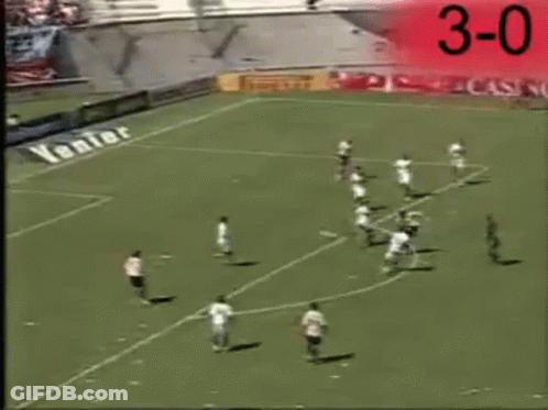 Man Red White Striped Shirt Playing Soccer 3-0 GIF