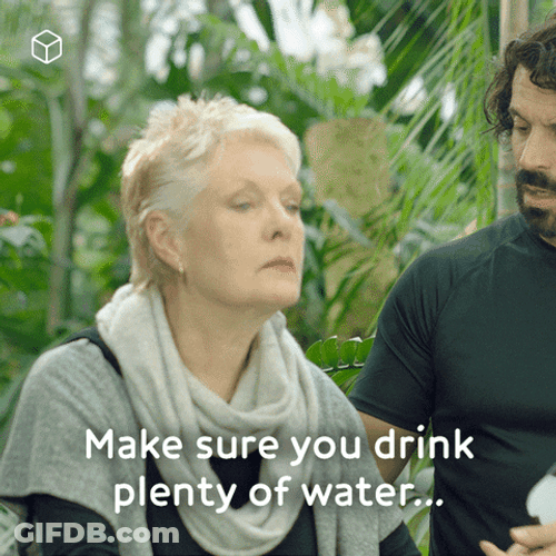 Man Reminding Old Woman To Drink Water Plenty GIF