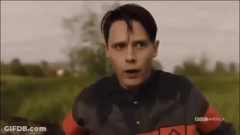 Man Riding Bike In Field GIF