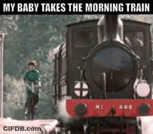 Man Riding Bike In Front Of Train Saying My Baby Takes The Morning Train GIF