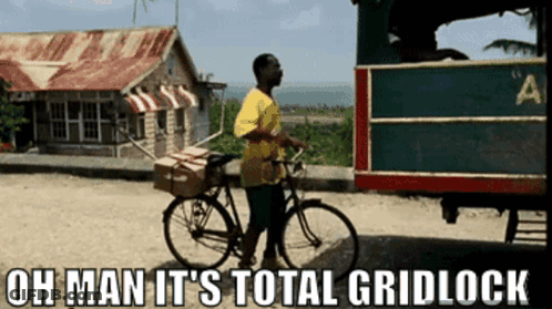 Man Riding Bike Saying Oh Man It's Total Gridlock GIF