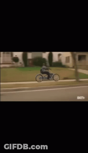 Man Riding Blue Bicycle GIF