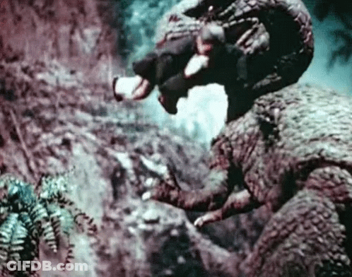 Man Riding Dinosaur GIF