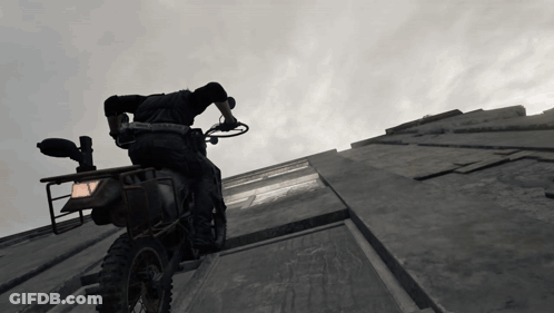 Man Riding Dirt Bike Down Concrete Wall GIF