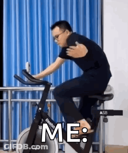 Man Riding Exercise Bike Saying Me GIF