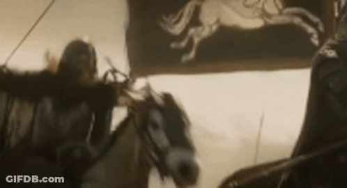 Man Riding Horse In Black And White GIF