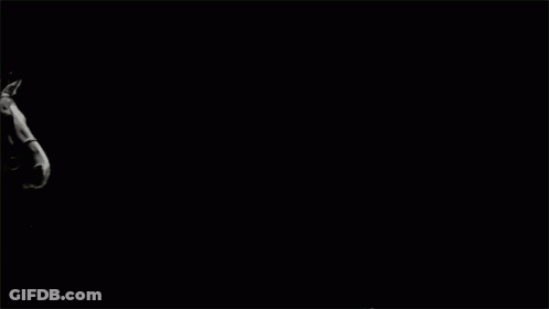 Man Riding Horse In Black And White GIF