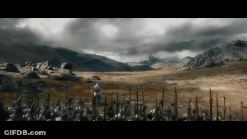 Man Riding Horse In Field With Mountain GIF