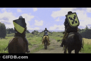 Man Riding Horse With Yellow And Black Shield GIF