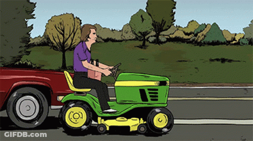 Man Riding John Deere Lawn Mower On Road GIF