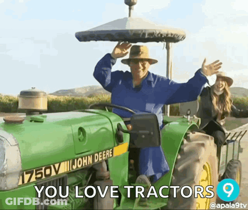 Man Riding John Deere Tractor With Woman On Back GIF