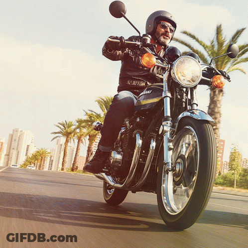 Man Riding Kawasaki Motorcycle GIF