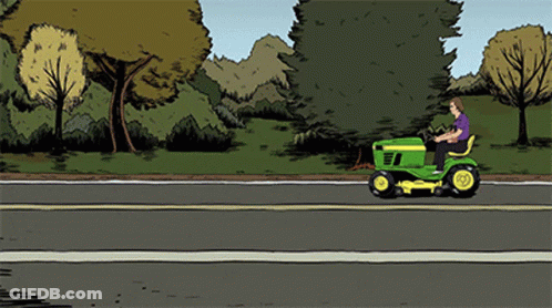 Man Riding Lawn Mower Down Road GIF