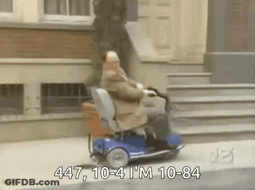 Man Riding Mobility Scooter 447 10-4 10-84 GIF