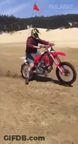 Man Riding Motorcycle Down Highway Black And White GIF