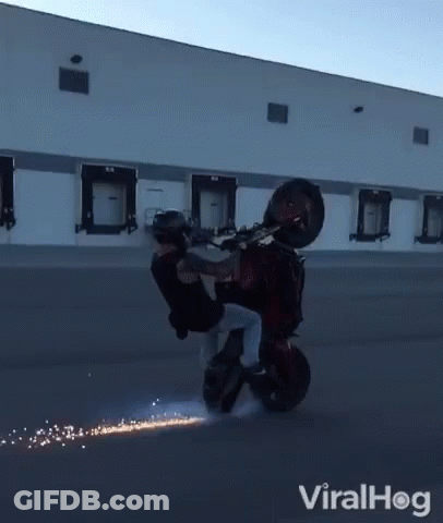 Man Riding Motorcycle In Front Of Building With Viralhog GIF