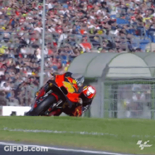 Man Riding Motorcycle On Track With Crowd GIF