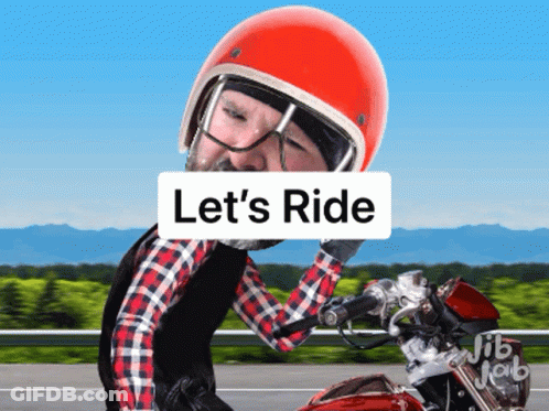 Man Riding Motorcycle With Lets Ride Sign GIF