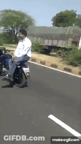 Man Riding Motorcycle With License Plate 4618 GIF