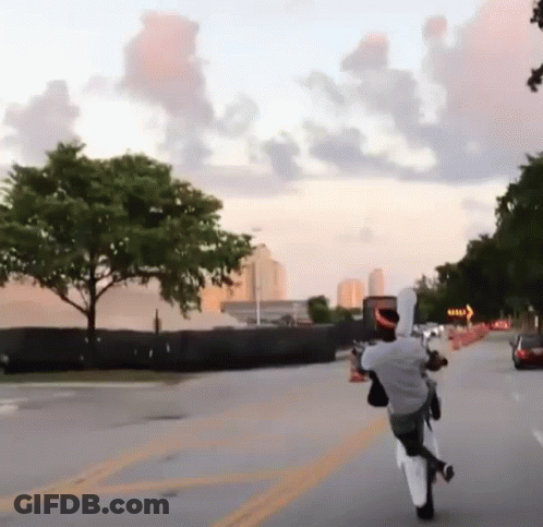 Man Riding Motorcycle With Right Arrow GIF
