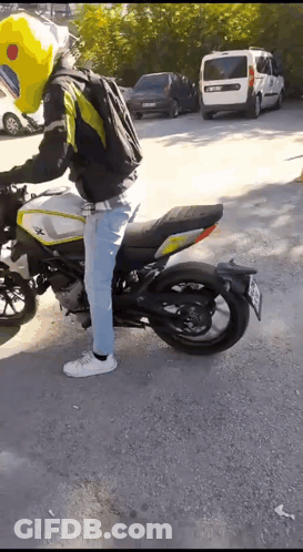 Man Riding Motorcycle With TC 88 License Plate GIF