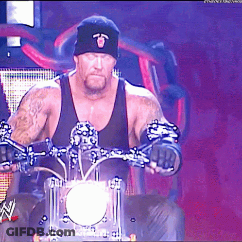 Man Riding Motorcycle With W Logo GIF