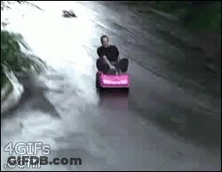 Man Riding Pink Toy Car With 4Gifs.com GIF