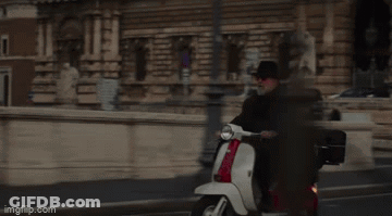 Man Riding Red And White Scooter GIF