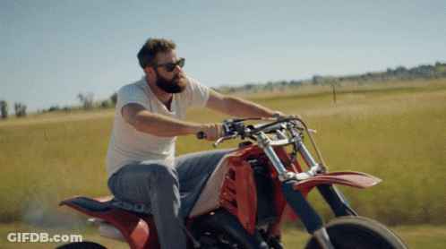 Man Riding Red Dirt Bike Number 29 GIF