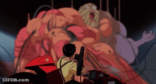 Man Riding Red Motorcycle With C On Back GIF