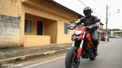Man Riding Red Motorcycle GIF