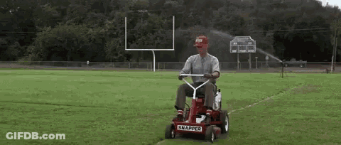 Man Riding Red Snapper Lawn Mower GIF