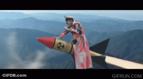 Man Riding Rocket With Radioactive Symbol GIF