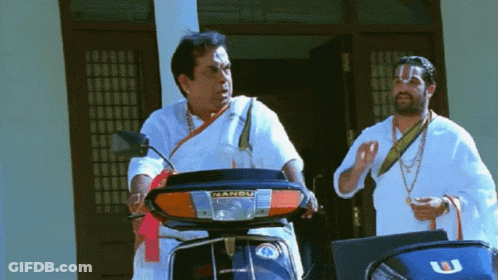 Man Riding Scooter With Nanda GIF