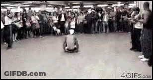 Man Riding Skateboard In Front Of Crowd GIF