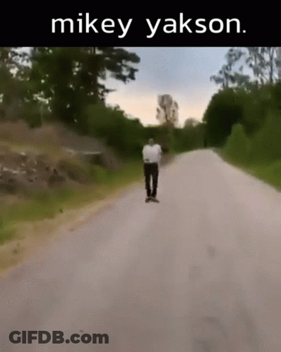 Man Riding Skateboard With Mikey Yakson GIF